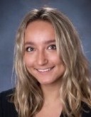 Headshot of Ada Kamenetskiy, a woman with blond hair who is a research assistant in the biobehavioral lab.