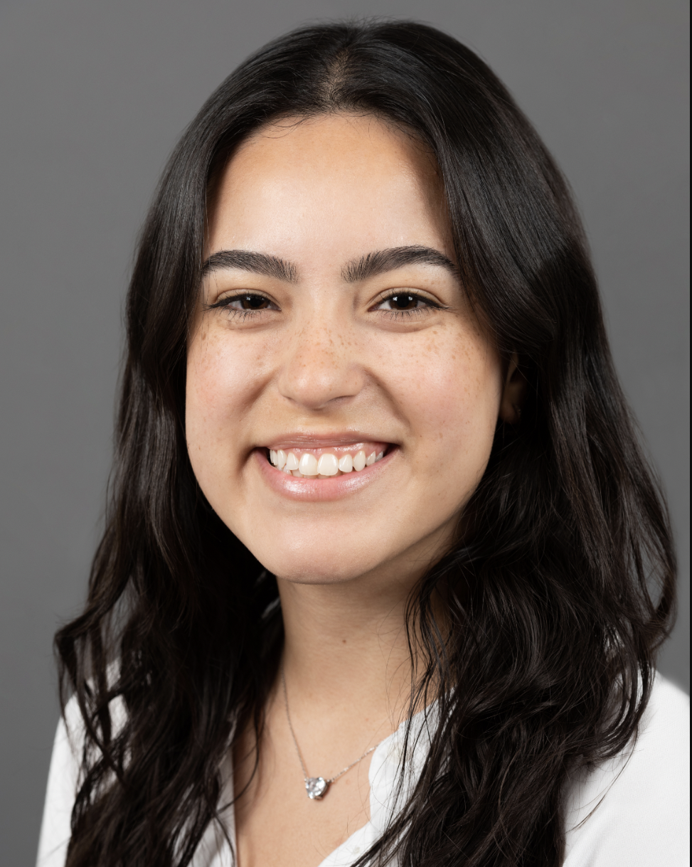 Headshot of Natalie Cayon, a woman with dark hair who is a research assistant in the biobehavioral lab.